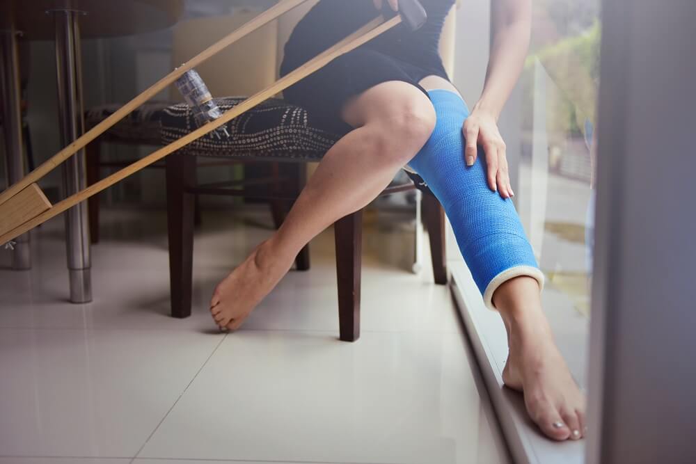 Injured leg with bandage from slip and fall